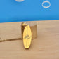 Gold Wave Surfboard Pendant